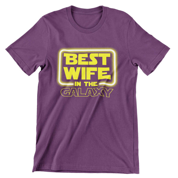 Purple short sleeve shirt with "Best wife in the galaxy" printed in yellow glowing text. 