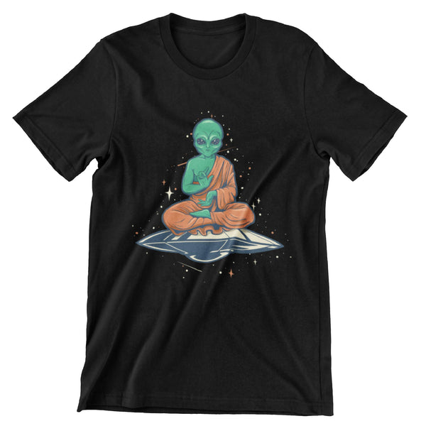 Green alien dressed in orange monks robe sitting in a yoga pose on a flying saucer printed on a black short sleeve shirt.