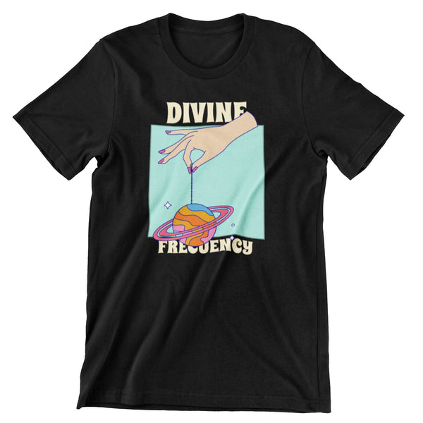 Black t-shirt that shows a hand holding a planet by a string that says divine frequency.