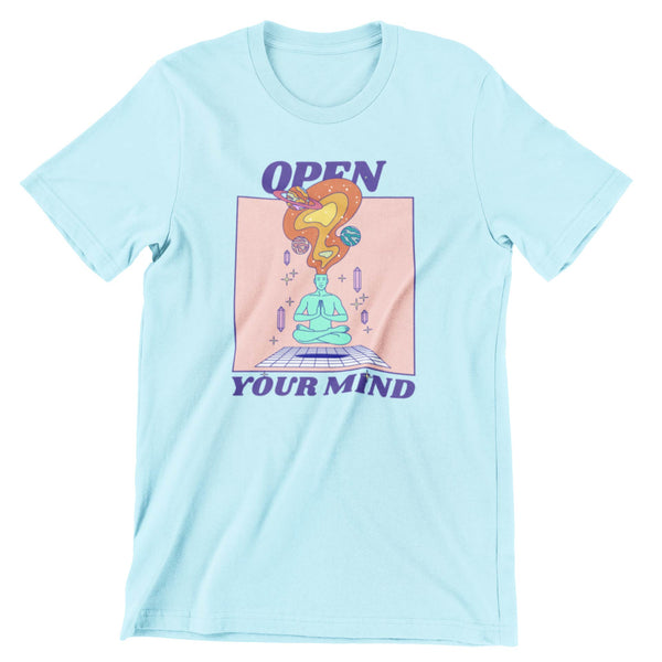 Light blue short sleeve t-shirt that says open your mind with an image of a person that shows planets and space protruding from its mind.