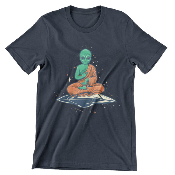 Green alien dressed in orange monks robe sitting in a yoga pose on a flying saucer printed on a navy short sleeve shirt.