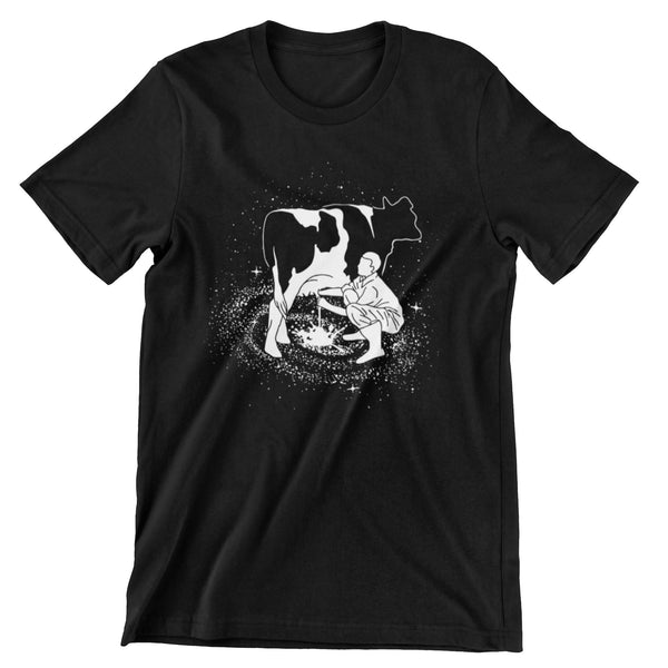 Black short sleeve t-shirt with an all white print of a farmer milking a cow over a space galaxy.