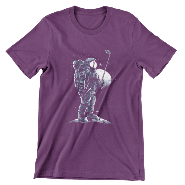 Purple Short Sleeve t-shirt of an astronaut holding up a selfie stick in space.