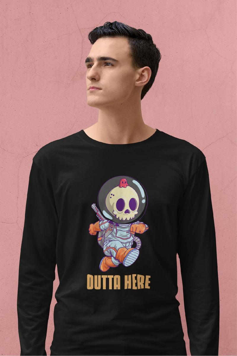 Guy wearing black long sleeve t-shirt with a skeleton spaceman that says outta here.