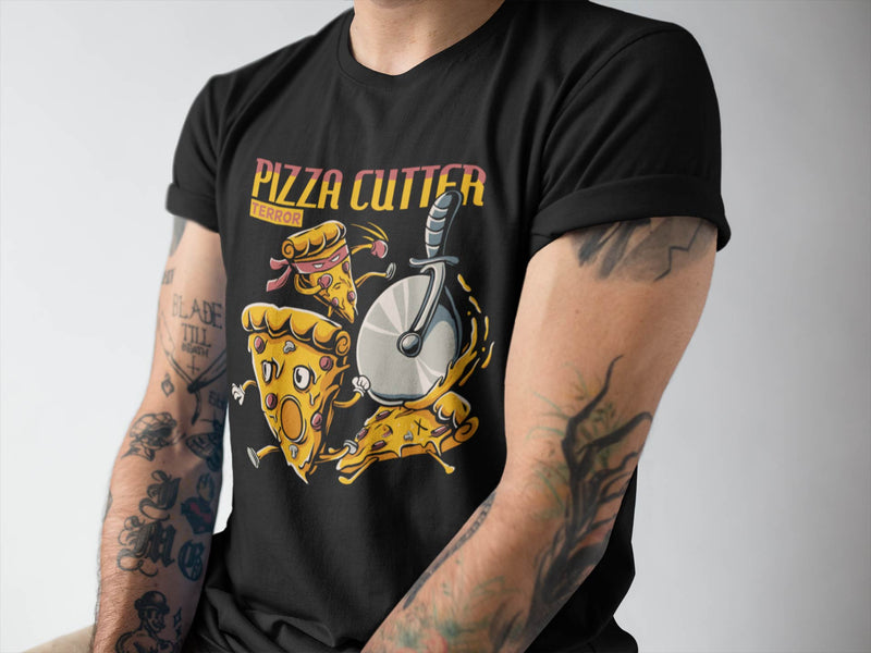 Close up of a guy wearing a black short sleeve t-shirt that has a pizza cutter chasing around pizza slices.