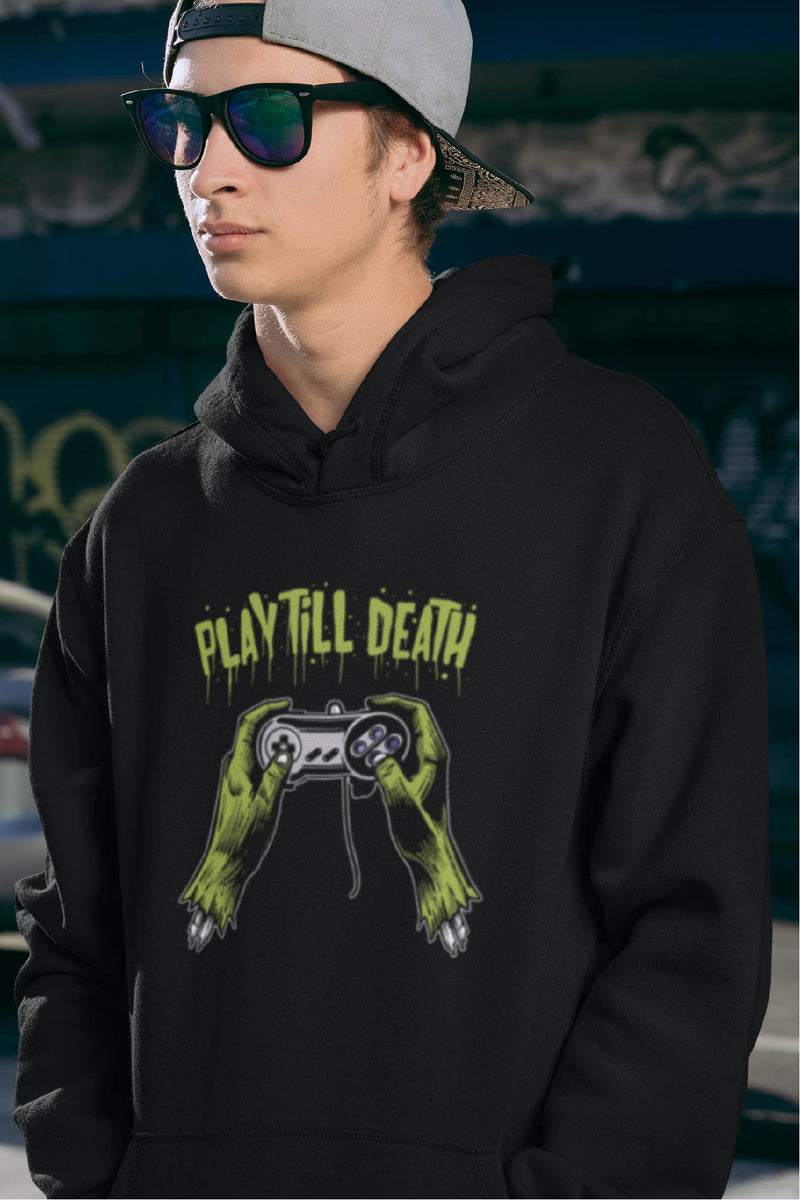 Guy wearing black Hoodie with zombie hands holding a came controller and the text Play Till Death above.