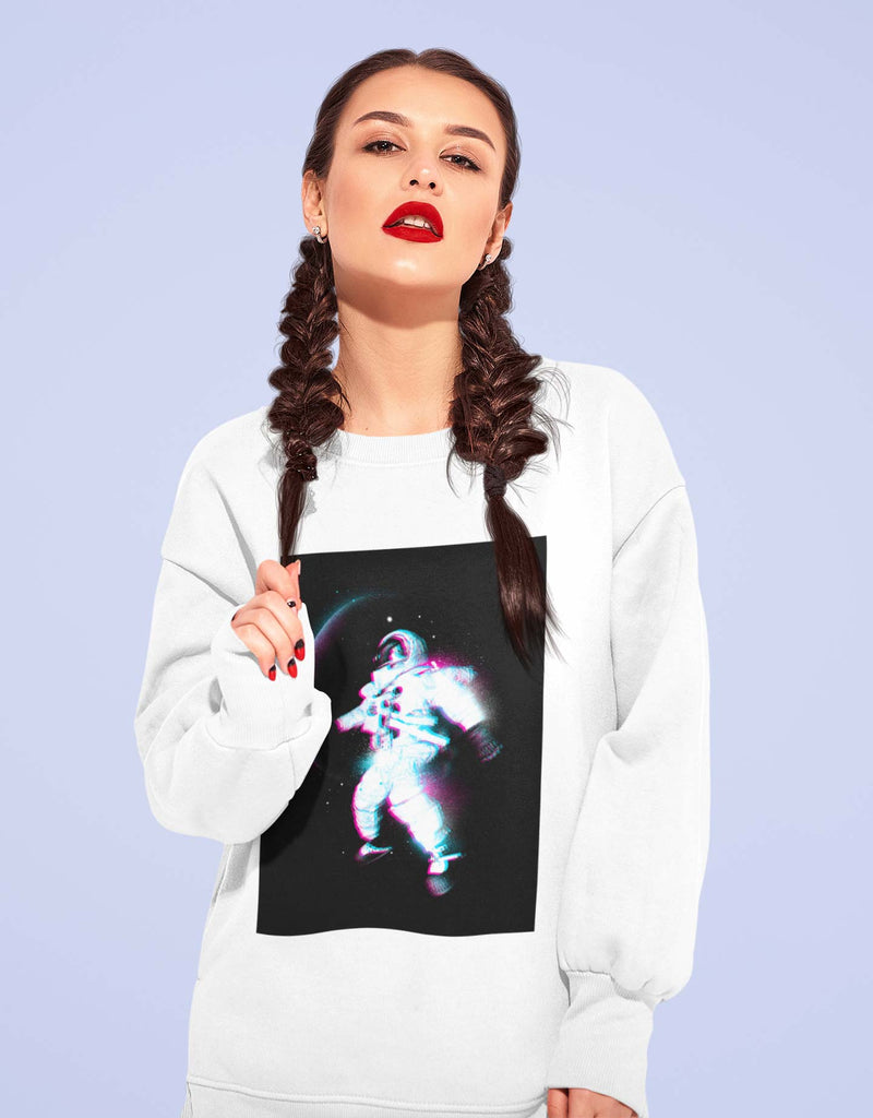 woman in white crewneck sweatshirt with a blurred astronaut floating in space infant of blurry planet in background. Full color print. 