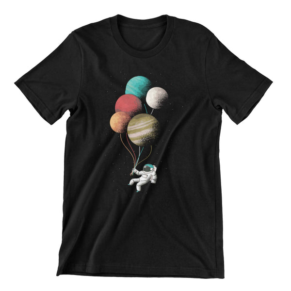 Black t-shirt with a graphic print of an astronaut floating in space being supported by planet like balloons.