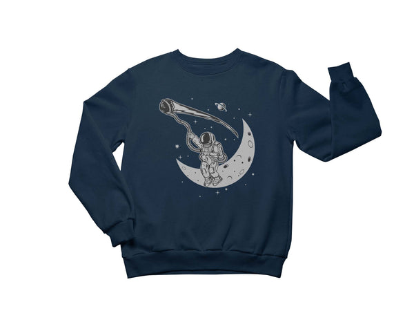 Navy crewneck sweatshirt with an astronaut lassoing a meteor while sitting on the crescent moon. 